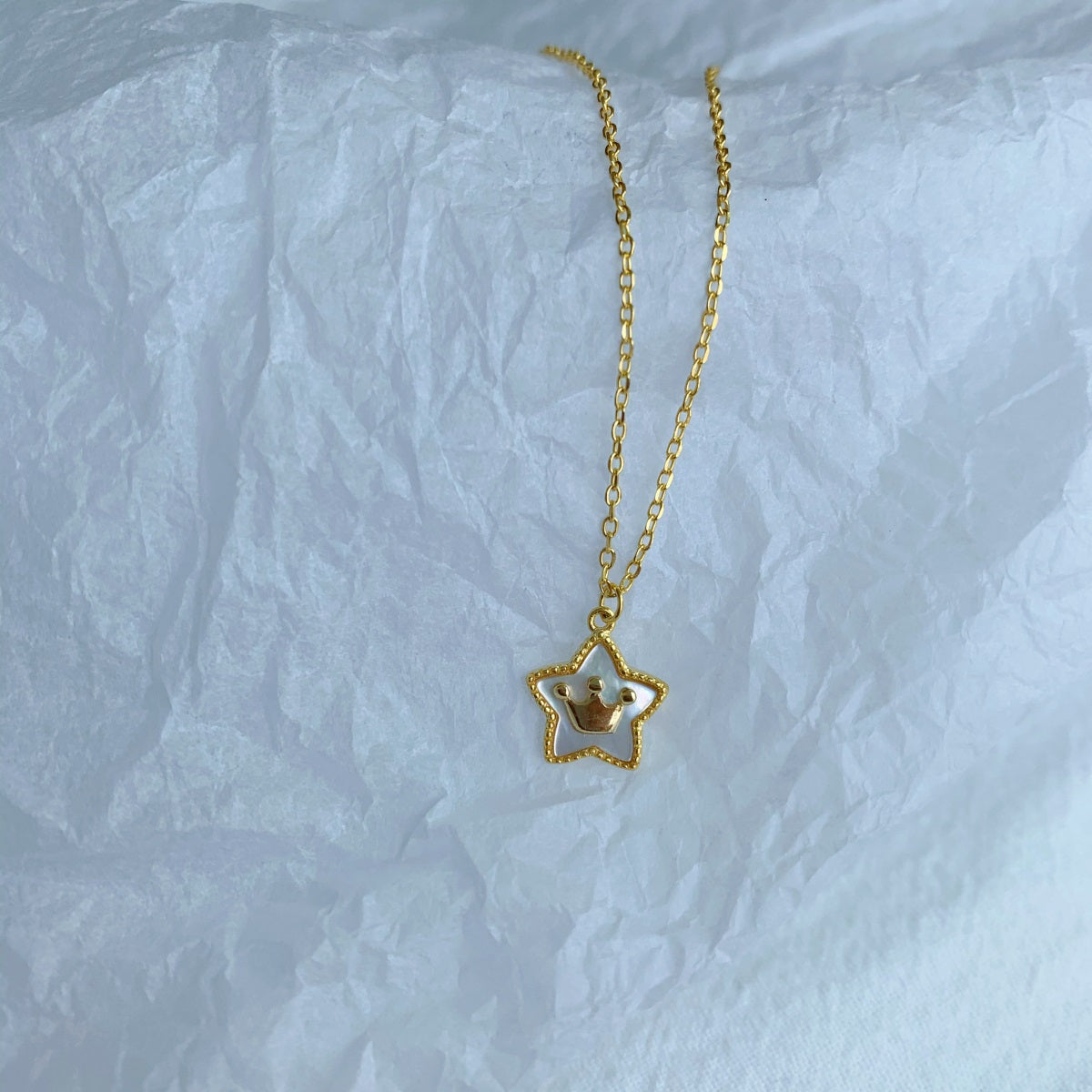 Cadena baño Oro 18 K con dije estrella-corona