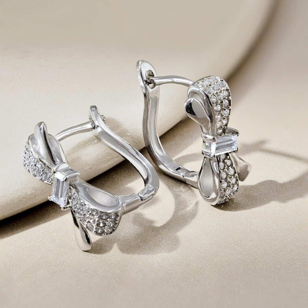 Arete  plata-zirconias  moño