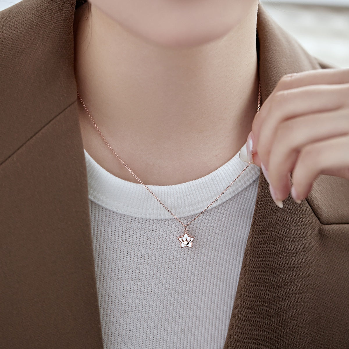 Cadena baño de Oro rosa con dije estrella-corona