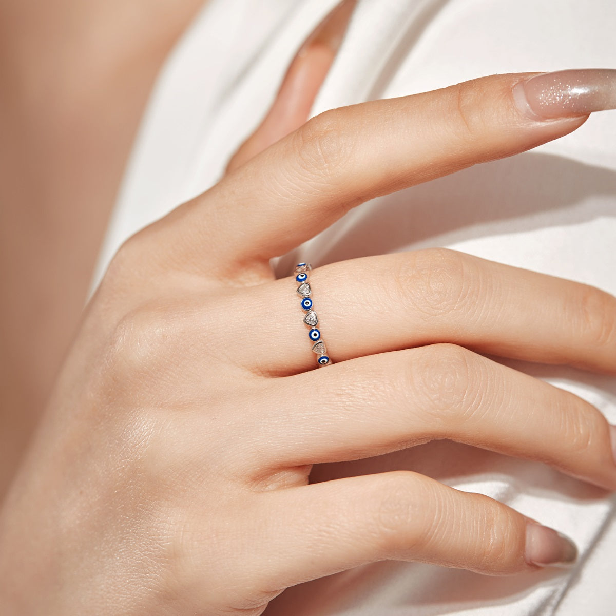 Anillo plata ojitos azul-zirconia corazón