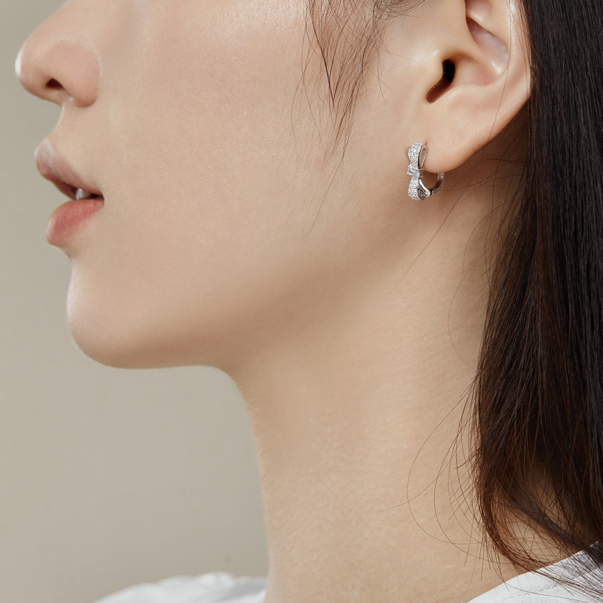 Arete  plata-zirconias  moño