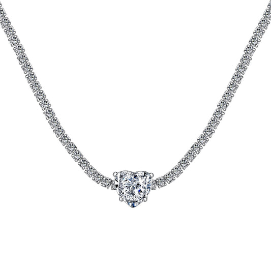 Cadena Zirconias blancas con dije corazón.